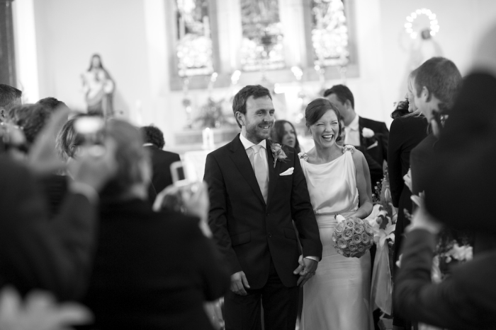 bride and groom walking down aisle